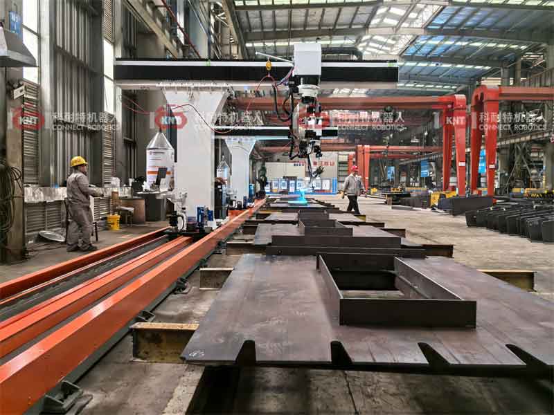 Eight-axis cantilever robotic welding system performing precision welding on large bridge steel components